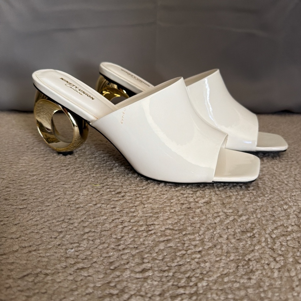 Elegant White Mules with Gold Heel